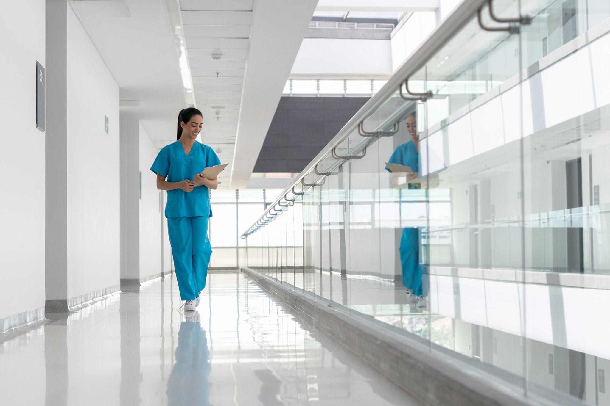 female nurse supporting patient